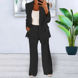 Elegantly styled black women's suit set featuring a slim-fit blazer and wide-leg trousers