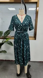 Detailed view of this dark green floral print V-neck midi dress on a garment form