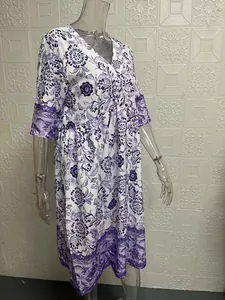 Side view of elegant V-neck floral print loose maxi dress on clear mannequin