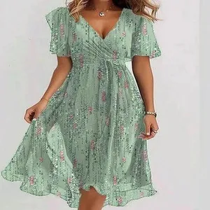 Mint green floral V-neck dress with flutter sleeves and elastic waist for summer wear