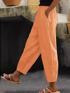 Women's orange cotton linen casual pants with elastic waist and side pockets