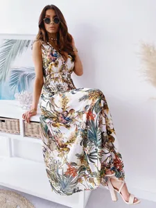 Bohemian style floral print V-neck sleeveless maxi dress, ideal for summer beach parties.