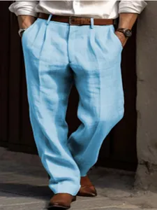 Men's light blue straight-leg linen trousers with double pleats for a casual look