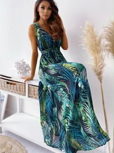 Elegant V-neck sleeveless maxi dress with a vibrant tropical leaf print design