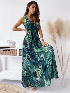 Elegant tropical leaf print V-neck sleeveless maxi dress with a stylish tie-waist detail