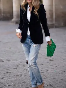 Elegant navy blue velvet slim-fit blazer for women, styled for a chic street look