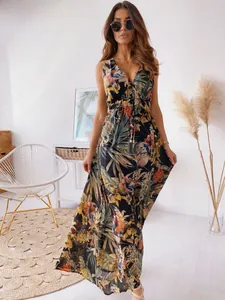Full-body shot of a tropical print sleeveless V-neck maxi dress for summer vacations