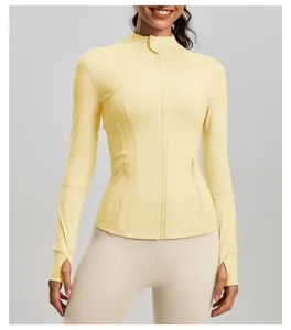 Close-up detail of a slim-fit yoga jacket featuring a stand collar and zipper in light yellow