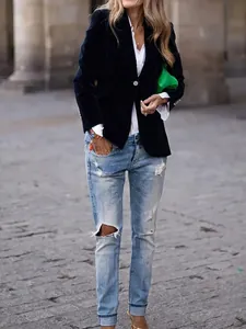 Elegant dark blue velvet slim-fit blazer jacket for women styled in street fashion