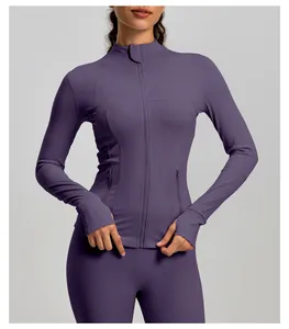 Close-up detail of women's purple slim-fit zip-up yoga jacket with a stand collar