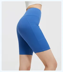 Close-up view of blue high-waisted yoga shorts featuring side pocket and striped texture