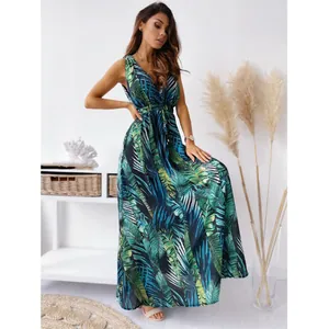 Elegant tropical leaf print maxi dress with deep V-neck and sleeveless summer design.