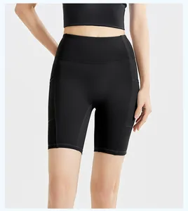 High waisted black yoga shorts with side pockets and subtle stripe texture details