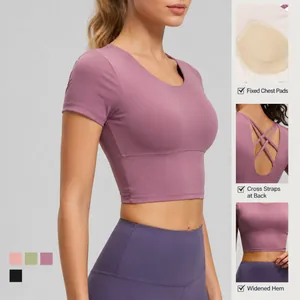 Damen Kurzarm Yoga Oberteil in Mauve mit überkreuztem Rücken und integrierten Pads