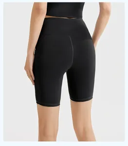 Detailed back view of high-waisted black yoga shorts featuring butt-lifting seams