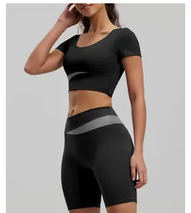 Slim fit padded yoga set featuring color-block short sleeve top and high waist shorts