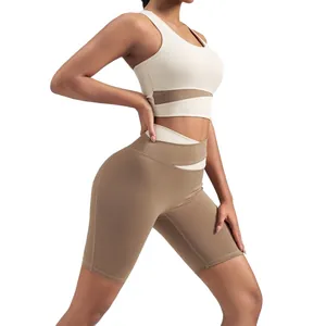 Seamless color-block sports yoga set featuring padded bra and high waist biker shorts