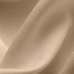 Close-up detail of high-stretch breathable polyester fabric texture for yoga sports crop top