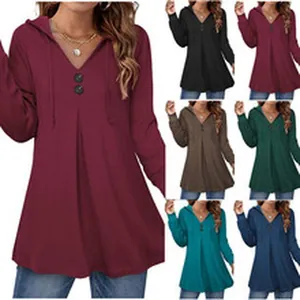 Detail view showing various colors of the women's hooded V-neck long sleeve T-shirt.
