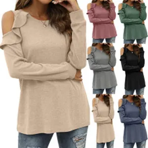 Detail view of cold-shoulder ruffle top in multiple colors for women's autumn style.