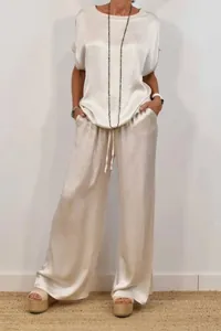 Elegant champagne satin two-piece leisure set with loose blouse and wide-leg pants