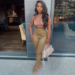 Chic olive green high-waisted PU leather pants featuring trendy split hems for a slim fit.