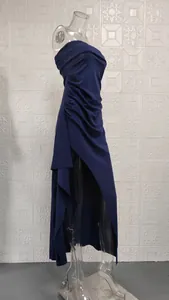 Side view of elegant navy blue ruched tube top maxi dress featuring a sexy high slit