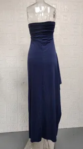 Back view of a navy blue strapless tube top maxi dress with elegant pleating details.