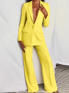 Elegante gele tweedelige zakelijke pakset met blazer en broek met wijde pijpen