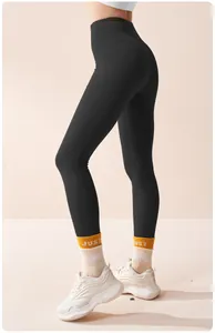 High-waisted black fleece-lined yoga leggings with seamless design for women fitness