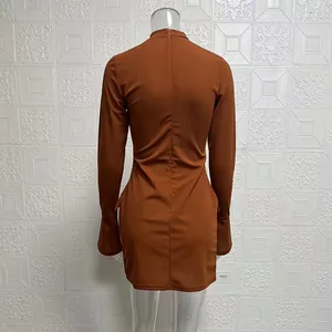 Back view of elegant rust brown long-sleeve bodycon mini dress with zipper and bell sleeves