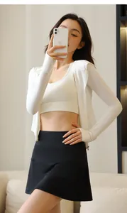 Detailed view of high waist black pleated skort for summer fitness and active sports.