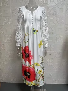 Detailed view of elegant white floral maxi dress featuring intricate lace crochet sleeves