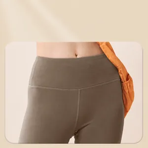 High-waist tummy control leggings in olive green, seamless and high-stretch fabric.