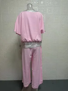 Back view of pink batwing sleeve top and wide-leg pants set with silver sequins