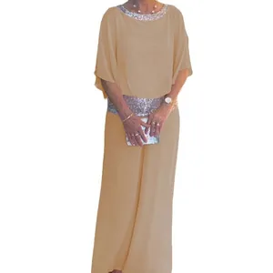 Elegant champagne two-piece outfit with sequined batwing top and wide-leg pants for women
