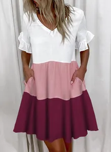 Detailed view of women's tiered color-block summer dress with V-neck and pockets