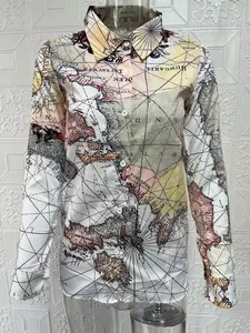 Classic long-sleeved button-up blouse featuring a vintage world map print and pointed collar