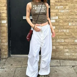 Stylish white low-waist wide-leg cargo pants with drawstring for a trendy Y2K look