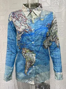 Detail view of a long-sleeve women's shirt featuring an artistic world map print pattern