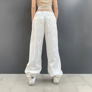 Detailed back view of white low-rise wide-leg cargo pants with large flap pockets