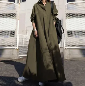 Detailed view of the olive green loose cotton linen long-sleeved maxi dress fabric