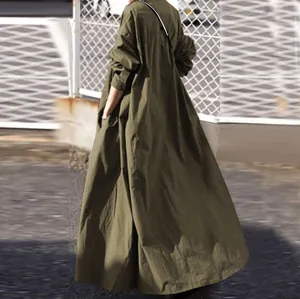 Back view of an oversized olive green linen maxi dress with long sleeves and large hem