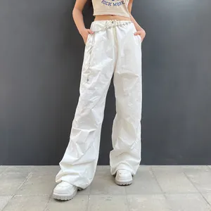 Low-waisted white wide-leg cargo pants with adjustable drawstring for women