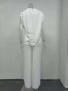 Rear view of white sleeveless top and pleated wide-leg trousers fashion two-piece set