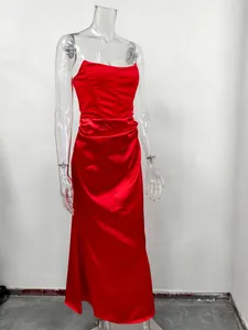 Elegant full-length red strapless satin evening gown displayed on a clear mannequin