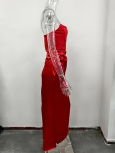 Side view detail of an elegant red satin strapless evening gown for formal events