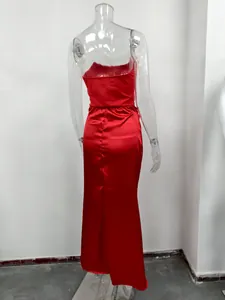 Back view detail showing the fit of a red satin tube top backless slim evening gown