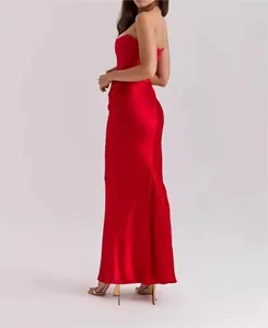 Elegant red strapless satin evening gown showing backless detail and slim fit design