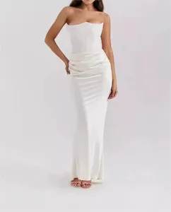 Elegant white strapless floor-length evening gown with sophisticated draped satin skirt details